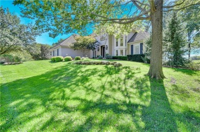 Welcome to this exquisite 1.5-story residence in the prestigious on Loch Lloyd Country Club in Missouri - for sale on GolfHomes.com, golf home, golf lot