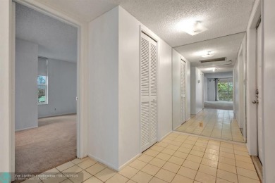 Priced to sell! Large corner unit. Freshly painted interior on Palm-Aire Country Club and Resort - Palms in Florida - for sale on GolfHomes.com, golf home, golf lot