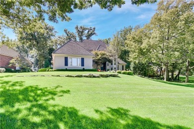 Welcome to this exquisite 1.5-story residence in the prestigious on Loch Lloyd Country Club in Missouri - for sale on GolfHomes.com, golf home, golf lot