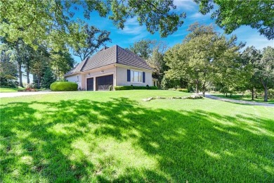 Welcome to this exquisite 1.5-story residence in the prestigious on Loch Lloyd Country Club in Missouri - for sale on GolfHomes.com, golf home, golf lot