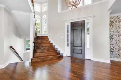 Welcome to this exquisite 1.5-story residence in the prestigious on Loch Lloyd Country Club in Missouri - for sale on GolfHomes.com, golf home, golf lot