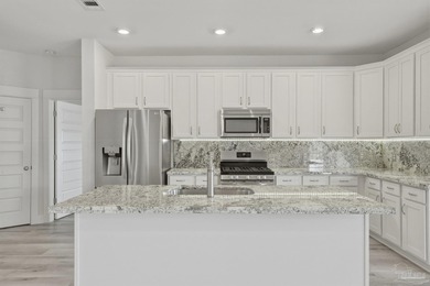 Built in 2021 and thoughtfully elevated beyond standard builds on Champion Golf Club in Florida - for sale on GolfHomes.com, golf home, golf lot