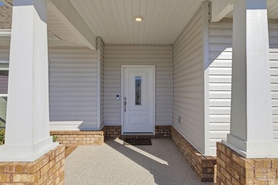 Built in 2021 and thoughtfully elevated beyond standard builds on Champion Golf Club in Florida - for sale on GolfHomes.com, golf home, golf lot