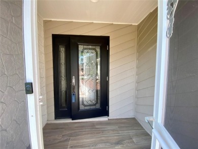 Located in the desirable Highland Lakes community, this on Highland Lakes Executive Golf Course in Florida - for sale on GolfHomes.com, golf home, golf lot