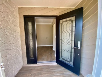 Located in the desirable Highland Lakes community, this on Highland Lakes Executive Golf Course in Florida - for sale on GolfHomes.com, golf home, golf lot