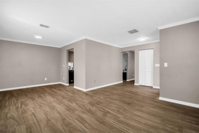 Located in the desirable Highland Lakes community, this on Highland Lakes Executive Golf Course in Florida - for sale on GolfHomes.com, golf home, golf lot