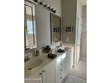 This meticulously maintained 2400 square foot home, nestled in on Castle Bay Golf and Country Club in North Carolina - for sale on GolfHomes.com, golf home, golf lot