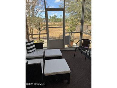 This meticulously maintained 2400 square foot home, nestled in on Castle Bay Golf and Country Club in North Carolina - for sale on GolfHomes.com, golf home, golf lot