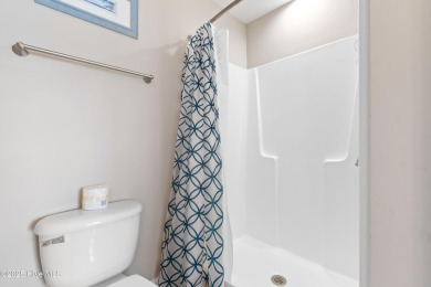 Discover unit 9102 at 105 S. E. 58th St. in the picturesque Oak on Oak Island Golf Club in North Carolina - for sale on GolfHomes.com, golf home, golf lot