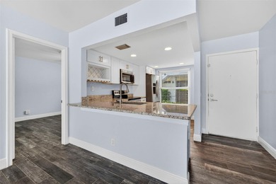 Enjoy resort-style living in the Isla Del Sol Golf Course on Isla Del Sol Yacht and Country Club in Florida - for sale on GolfHomes.com, golf home, golf lot