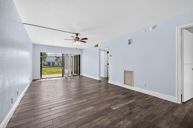 Enjoy resort-style living in the Isla Del Sol Golf Course on Isla Del Sol Yacht and Country Club in Florida - for sale on GolfHomes.com, golf home, golf lot