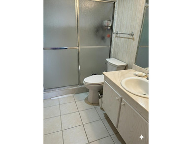 Welcome to your dream living space! Nestled in a serene all-age on Fountains Golf and Country Club in Florida - for sale on GolfHomes.com, golf home, golf lot