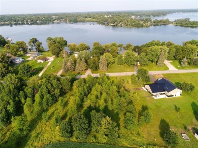 Build your showcase dream property on this park-like .73 acre on Geneva Golf Club in Minnesota - for sale on GolfHomes.com, golf home, golf lot