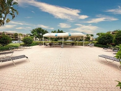 Welcome to your dream living space! Nestled in a serene all-age on Fountains Golf and Country Club in Florida - for sale on GolfHomes.com, golf home, golf lot