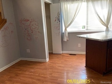 Make it your own in this two story home with 4 bedrooms and 2 on Rush Lake Hills Golf Club in Michigan - for sale on GolfHomes.com, golf home, golf lot