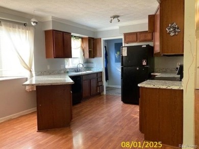 Make it your own in this two story home with 4 bedrooms and 2 on Rush Lake Hills Golf Club in Michigan - for sale on GolfHomes.com, golf home, golf lot