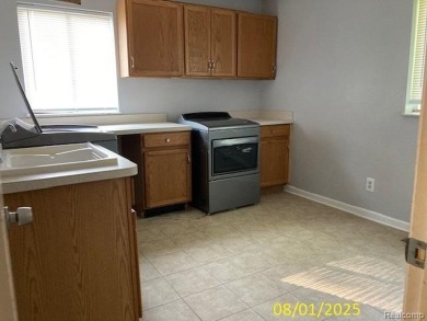 Make it your own in this two story home with 4 bedrooms and 2 on Rush Lake Hills Golf Club in Michigan - for sale on GolfHomes.com, golf home, golf lot