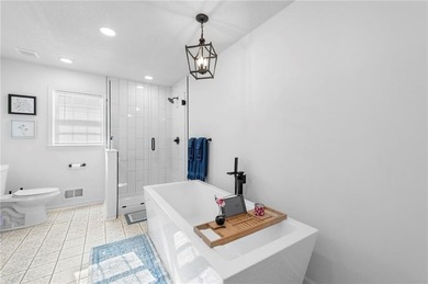 Updated, Luxury - 5 Bed | 3 Bath+ | Pool & Hot Tub | Golf Course on Country Club of Blue Springs in Missouri - for sale on GolfHomes.com, golf home, golf lot