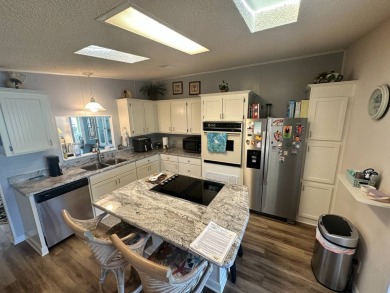 Lot rent is $1342.00 monthly  This well cared for 2 bedrooms/2 on Del Tura Golf and Country Club in Florida - for sale on GolfHomes.com, golf home, golf lot