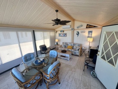 Lot rent is $1342.00 monthly  This well cared for 2 bedrooms/2 on Del Tura Golf and Country Club in Florida - for sale on GolfHomes.com, golf home, golf lot