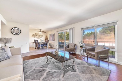 This beautifully maintained 2-bedroom, 2-bath home offers a on Leisure Village Par 3 Golf Course in California - for sale on GolfHomes.com, golf home, golf lot