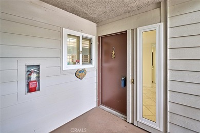 This beautifully maintained 2-bedroom, 2-bath home offers a on Leisure Village Par 3 Golf Course in California - for sale on GolfHomes.com, golf home, golf lot