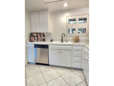 This beautifully maintained 2-bedroom, 2-bath home offers a on Leisure Village Par 3 Golf Course in California - for sale on GolfHomes.com, golf home, golf lot