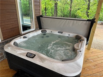 Experience unparalleled luxury living at The Estates of on The Club At Old Kinderhook in Missouri - for sale on GolfHomes.com, golf home, golf lot