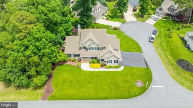 Welcome to this beautifully maintained 4-bedroom, 3-bath home on Cripple Creek Golf and Country Club in Delaware - for sale on GolfHomes.com, golf home, golf lot