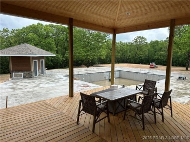 Experience unparalleled luxury living at The Estates of on The Club At Old Kinderhook in Missouri - for sale on GolfHomes.com, golf home, golf lot