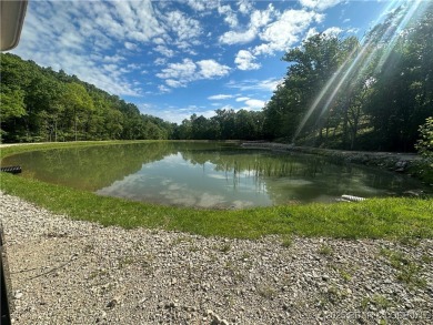 Experience unparalleled luxury living at The Estates of on The Club At Old Kinderhook in Missouri - for sale on GolfHomes.com, golf home, golf lot