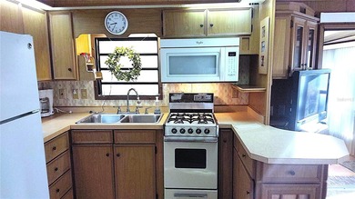 Waterfront property along Sugar Creek! This home features a on River Run Golf Links in Florida - for sale on GolfHomes.com, golf home, golf lot