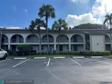 Beautiful unit 1/1 in Wynmoor 55+ won't last. First floor easy on Wynmoor Golf Course in Florida - for sale on GolfHomes.com, golf home, golf lot