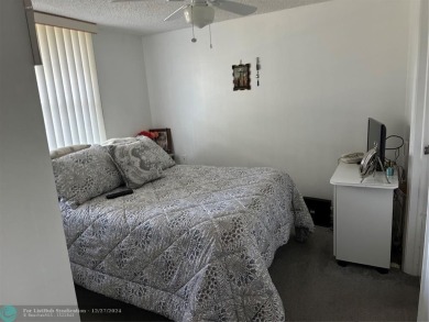 Beautiful unit 1/1 in Wynmoor 55+ won't last. First floor easy on Wynmoor Golf Course in Florida - for sale on GolfHomes.com, golf home, golf lot