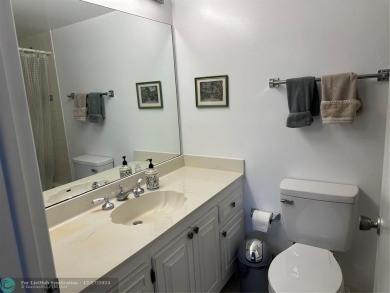 Beautiful unit 1/1 in Wynmoor 55+ won't last. First floor easy on Wynmoor Golf Course in Florida - for sale on GolfHomes.com, golf home, golf lot