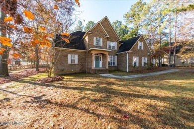 Welcome to this beautiful two-story all-brick home, located in on Barrington Hall Golf Course in Georgia - for sale on GolfHomes.com, golf home, golf lot