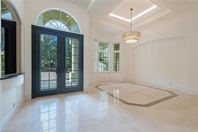 Tucked away on a quiet, tree-lined street in the exclusive on Colliers Reserve Country Club in Florida - for sale on GolfHomes.com, golf home, golf lot