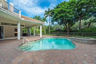 Tucked away on a quiet, tree-lined street in the exclusive on Colliers Reserve Country Club in Florida - for sale on GolfHomes.com, golf home, golf lot