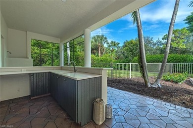 Tucked away on a quiet, tree-lined street in the exclusive on Colliers Reserve Country Club in Florida - for sale on GolfHomes.com, golf home, golf lot