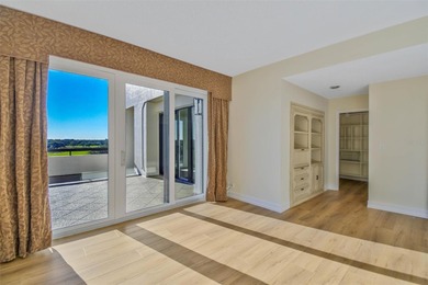 Perched atop the prestigious Belleair Country Club, this on Belleair Country Club in Florida - for sale on GolfHomes.com, golf home, golf lot