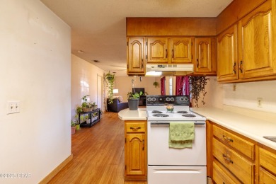 Beach Bungalow is located in the quaint neighborhood of Beach 87 on Sharks Tooth Golf Club in Florida - for sale on GolfHomes.com, golf home, golf lot