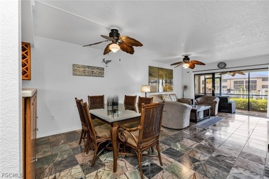 Just steps from your screened lanai to your private dock and on Saint Andrews South Golf Club in Florida - for sale on GolfHomes.com, golf home, golf lot