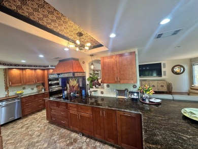 A one-of-a-kind, custom built, SHOWCASE HOME!!!  A beautiful on Del Tura Golf and Country Club in Florida - for sale on GolfHomes.com, golf home, golf lot