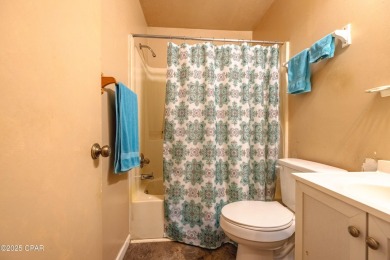 Beach Bungalow is located in the quaint neighborhood of Beach 87 on Sharks Tooth Golf Club in Florida - for sale on GolfHomes.com, golf home, golf lot