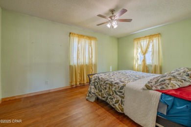 Beach Bungalow is located in the quaint neighborhood of Beach 87 on Sharks Tooth Golf Club in Florida - for sale on GolfHomes.com, golf home, golf lot