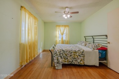 Beach Bungalow is located in the quaint neighborhood of Beach 87 on Sharks Tooth Golf Club in Florida - for sale on GolfHomes.com, golf home, golf lot