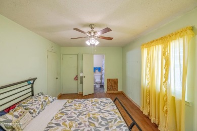 Beach Bungalow is located in the quaint neighborhood of Beach 87 on Sharks Tooth Golf Club in Florida - for sale on GolfHomes.com, golf home, golf lot