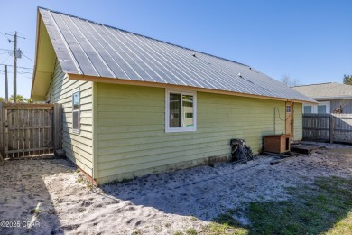 Beach Bungalow is located in the quaint neighborhood of Beach 87 on Sharks Tooth Golf Club in Florida - for sale on GolfHomes.com, golf home, golf lot