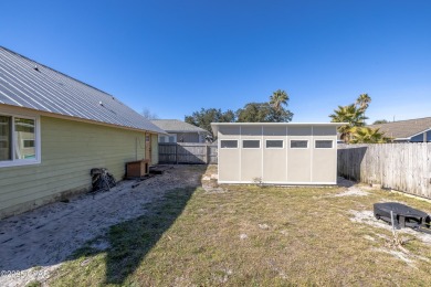 Beach Bungalow is located in the quaint neighborhood of Beach 87 on Sharks Tooth Golf Club in Florida - for sale on GolfHomes.com, golf home, golf lot