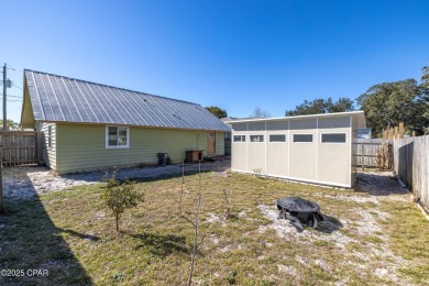 Beach Bungalow is located in the quaint neighborhood of Beach 87 on Sharks Tooth Golf Club in Florida - for sale on GolfHomes.com, golf home, golf lot